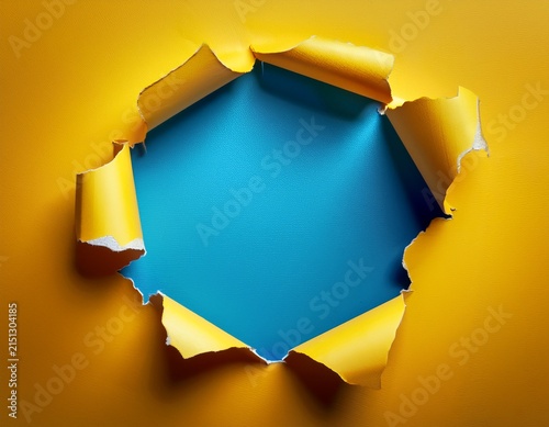 torn yellow paper with a blue background