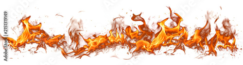 Fotografía Vibrant orange and yellow flames with embers rising against a transparent backgr