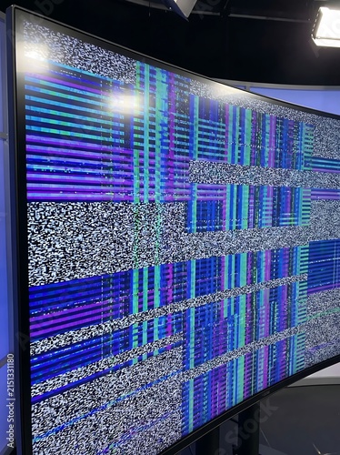 Colorful abstract digital display on large screen.