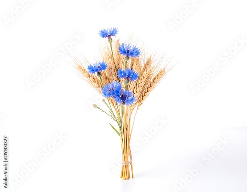 Colorful abstract floral arrangement in glass vase.