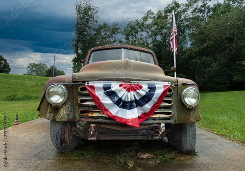 Old truck with flags and bunting in rural central Virginia