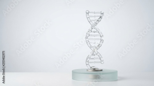 Transparent glass dna helix sculpture on a round pedestal for medical background and scientific poster design