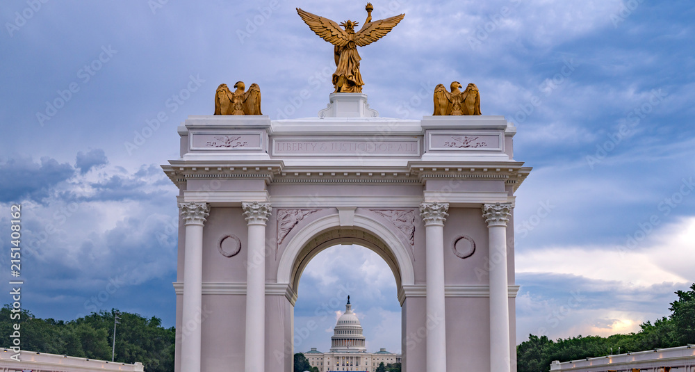 Fototapeta premium Washington DC arch frames Capitol. Patriotic Washington DC arch construction. Ceremonial Washington DC arch landmark. Washington DC arch marks America 250.