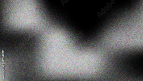 Grainy abstract backdrop with soft light gradients and dark shadows, atmospheric texture.