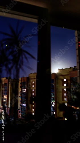 Moon runs over the city timelapse