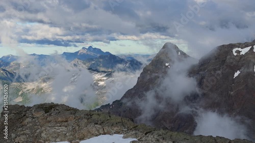 Clouds Drift Past Majestic Mountain Peaks in the Beautiful Wilderness of British Columbia, Canada