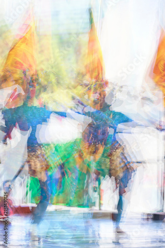 An expressive abstract depiction of dancers in motion, layered through intentional blur, translucency, and painterly effects. 