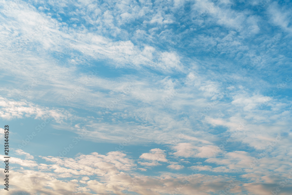 Fototapeta premium Soft Blue Sky Covered with Delicate White Clouds