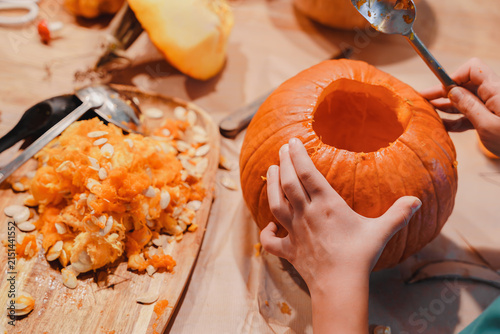 Canvastavla Child Scooping Seeds From Pumpkin for Halloween Carving