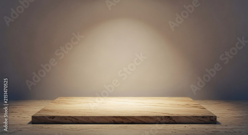 Wooden podium illuminated by a spotlight for product display in a minimalist studio setting
