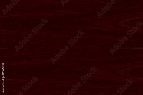 Top view of empty dark blackish red mahogany wood grain texture background with elegant vignette border