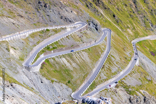 Winding mountain road with dramatic hairpin turns. Stelvio, Italy