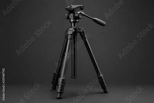 Professional camera tripod with adjustable legs and head, ideal for photography and videography