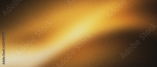 Golden abstract light trail with grainy texture on dark background. Warm amber glow and soft motion blur for cinematic overlays. Elegant orange light wave for luxury branding and web design.