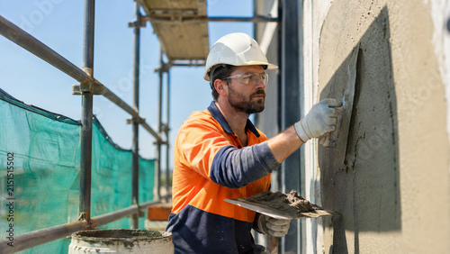 Australian Renderer Applying Cement Render to Exterior Wall on Construction Scaffolding