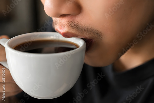 man with a cup of coffee cappuccino latte