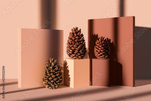 Pinecones and stickers arranged beside tabletop for scrapbook memory pages under golden hour glow, tidy centered arrangement.