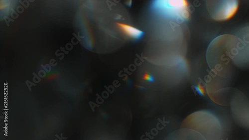 Real Shooted Cinematic Light Bokeh Overlay on Black Background in Slow Motion.