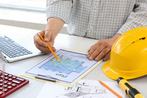 Male constructor working wi...