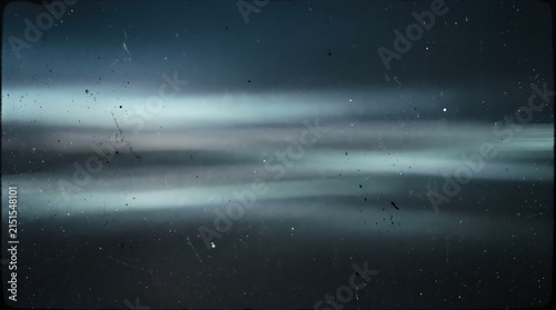 Grainy film noise dark blue abstract background, vintage texture with scratches and dust particles, retro aesthetic for creative design projects