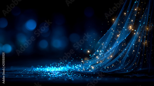Magical blue glitter background with soft bokeh lights and swirling sparkle effect