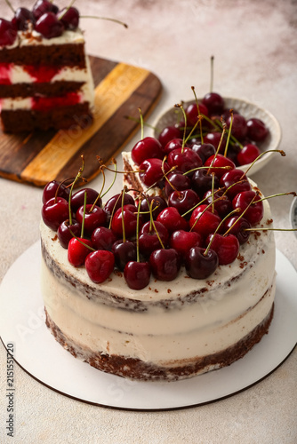 Tasty cherry cake on light ...