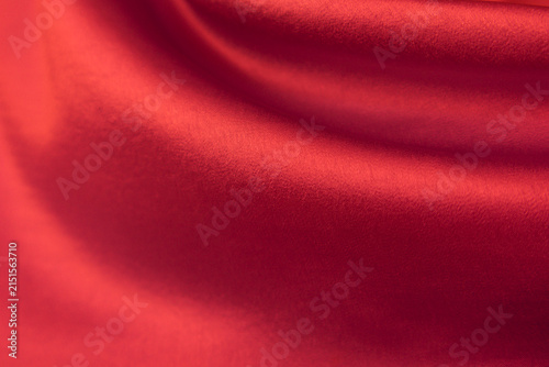 Foto Red satin or silk fabric as background