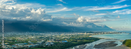 Aerial view of Hualien city, highlighting urban growth and beautiful mountains and clouds