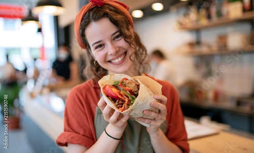 Happy gen z holding doner kebab