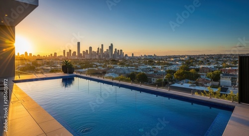 Luxury Rooftop Infinity Pool Overlooking City Skyline At Sunset