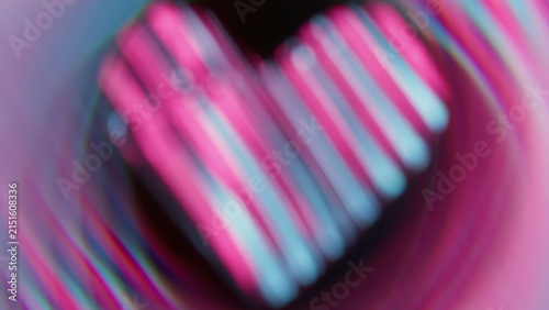 Twinkle love. Blur flare romantic. Defocused purple blue neon color heart sparkle lens flare glare flicker gleam on abstract dark black background.