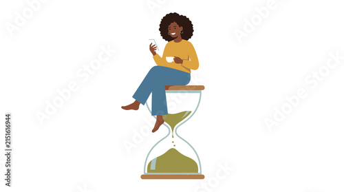 Young woman with curly hair sits on a large glass hourglass holding mobile phone and coffee