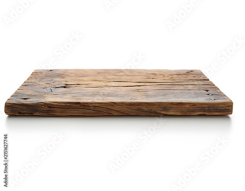 Close-up view of a wooden cutting board on white background.