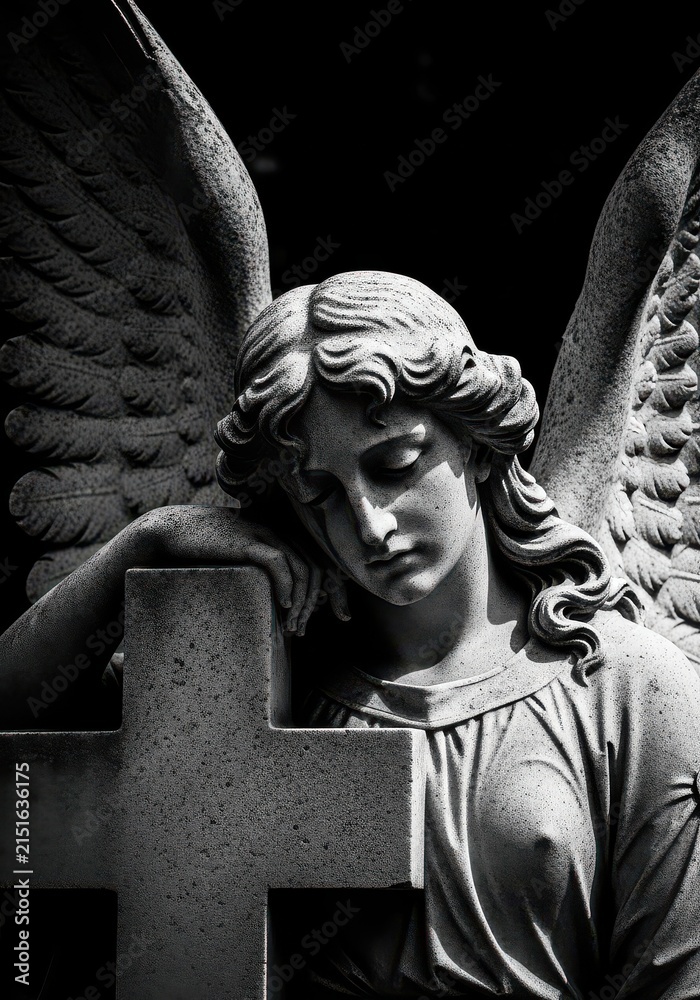 Fototapeta premium Mourning Angel Statue Leaning on a Cross in Black and White Dramatic Lighting for Cemetery Memorial