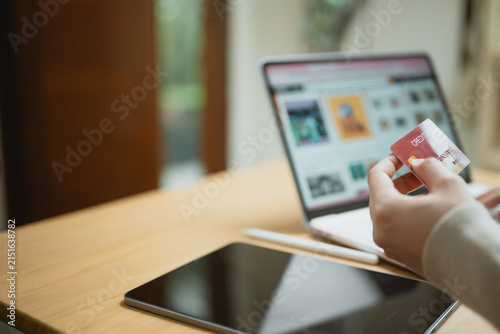 Bild auf Leinwand Customer using a credit card for Buy Now Pay Later checkout on an e-commerce website, highlighting flexible financing, digital payments, and convenient online shopping