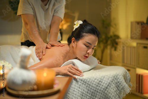 Photo set of Woman receiving shoulder massage at spa with warm light and deep relaxation mood