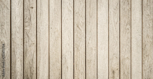 Canvastavla A close-up view of a wooden wall featuring vertical planks in various shades of light beige and gray