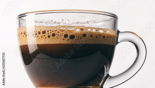 Close up espresso coffee cup glass hot beverage caffeine crema brown isolated morning drink aromatic fresh energy Italian strong transparent classic delicious macro foam gourmet shot breakfast