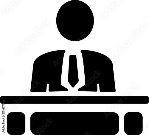 A minimalist black silhouette icon depicts a businessman wearing a tie behind a desk.