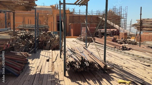 Panoramic shot of Construction Materials and Scaffolding During Historic Citadel Renovation