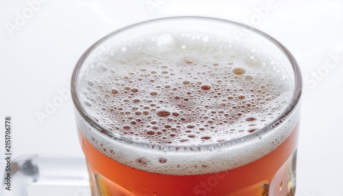 Close up of a glass of sparkling water with bubbles.