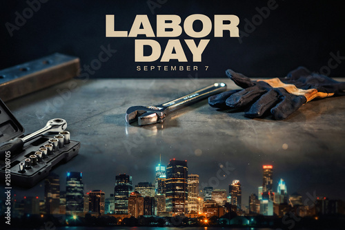 Labor Day September 7 celebration banner, industrial work tools on workbench, city skyline at night with holiday text