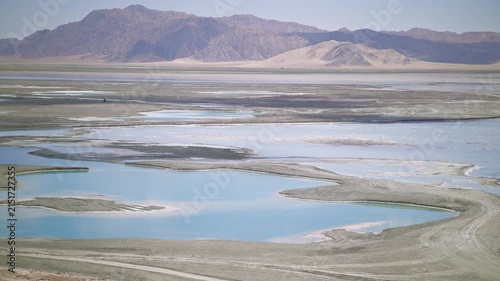 Aerial View of Dachaidan Emerald Lake Scenic Core Zone: Salt Road, Blue-Green Mineral Pools, Sky Reflection and Distant Mountains in Qinghai