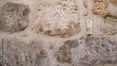 Textura de pared de piedra rústica con argamasa