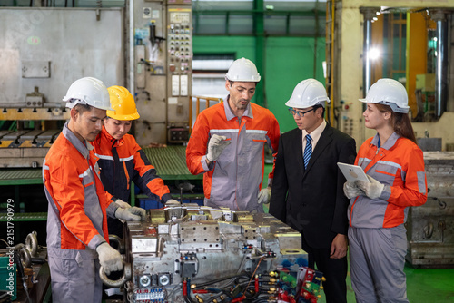 Engineer, factory, worker, helmet, machinery, inspection, industrial team review equipment in manufacturing plant