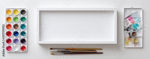White art supplies, paint tray, brushes