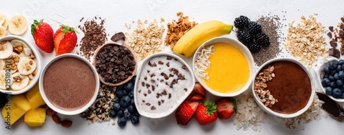 Assorted healthy breakfast bowls with fruit, granola, and toppings