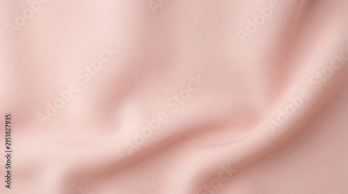 Soft pink fabric texture background with smooth elegant folds and seamless pattern for design
