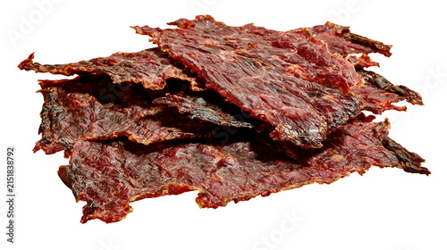 Фотография Dried beef jerky strips, thin and crispy texture