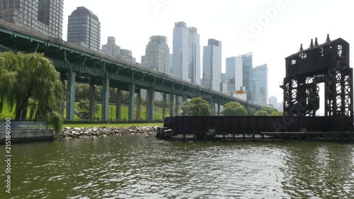 New York City Riverside Park South Manhattan United States. Modern residential building Upper West Side. Urban skyscraper skyline. Miller highway remnant, elevated viaduct. Industrial gantry dock pier